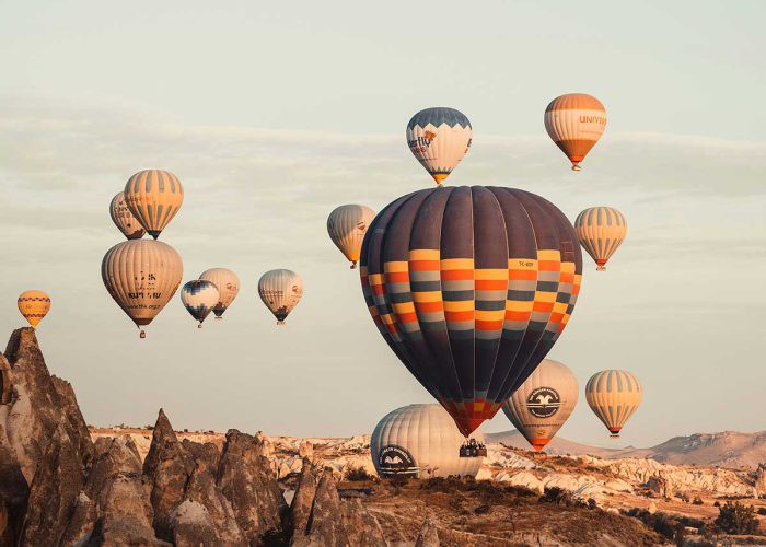 Hot air balloons on the sky during daytime in Cappadocia. infocappadocia.com