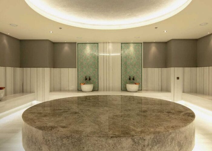 Cappadocia hamam experience with warm marble, steam therapy, and body scrub