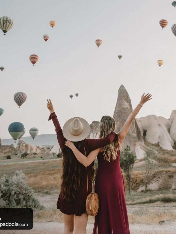 Tour guests watching hot air balloons in Cappadocia