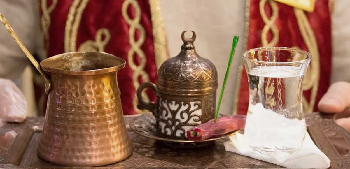 Brewing Turkish coffee on hot sand during Cappadocia cultural workshop