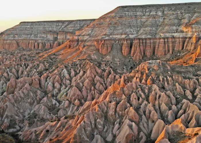 Rose Valley Cappadocia glowing pink rocks at sunset